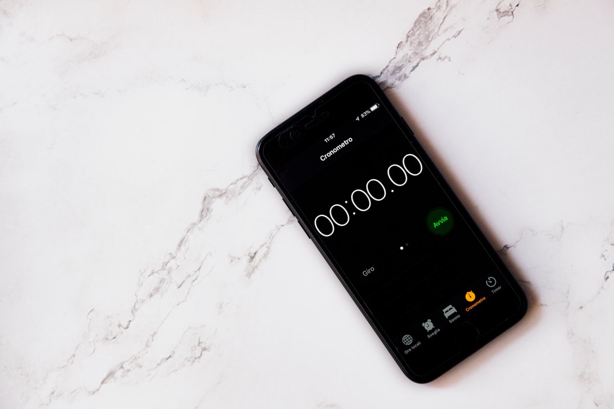 A phone showing a stopwatch stopped at zero